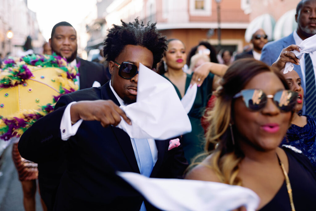 New Orleans wedding film photographer Saint Louis Cathedral second line